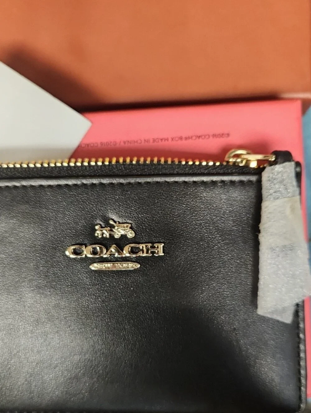 COACH Black Leather Zip Card Holder with Gold Logo
